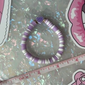 Purple clay bead bracelet for child